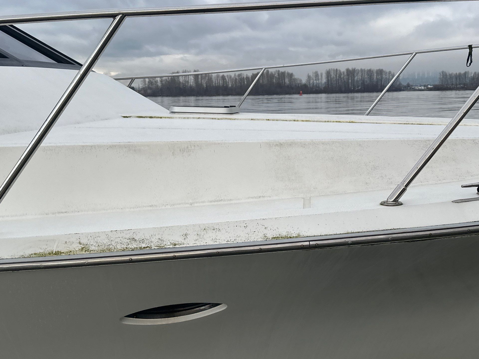 exterior yacht deck showing staining along a deck seam during inspection for potential water intrusion